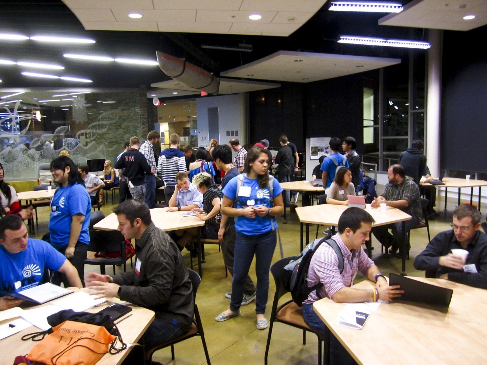 A large studio full of students at work during the conference