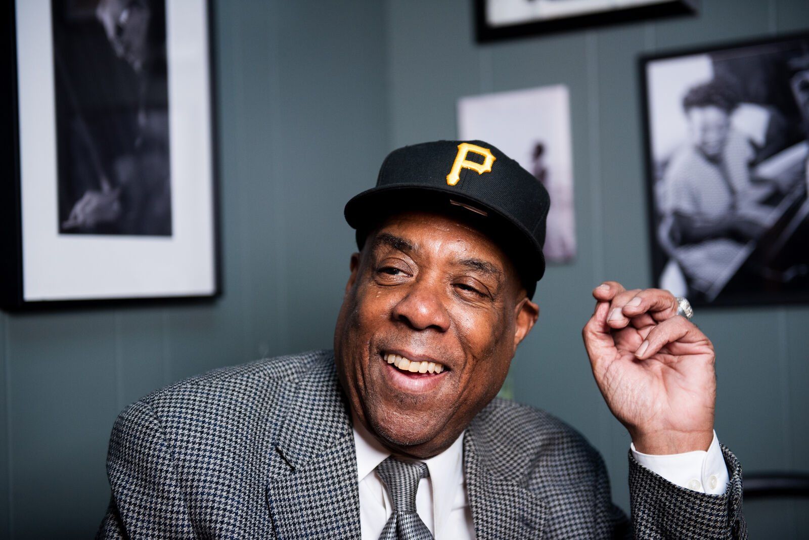 A musician in a Pirates cap laughing