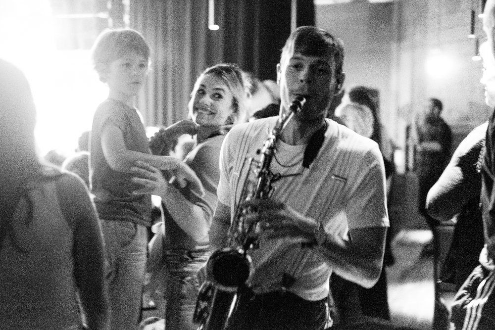 A saxophonist in the crowd