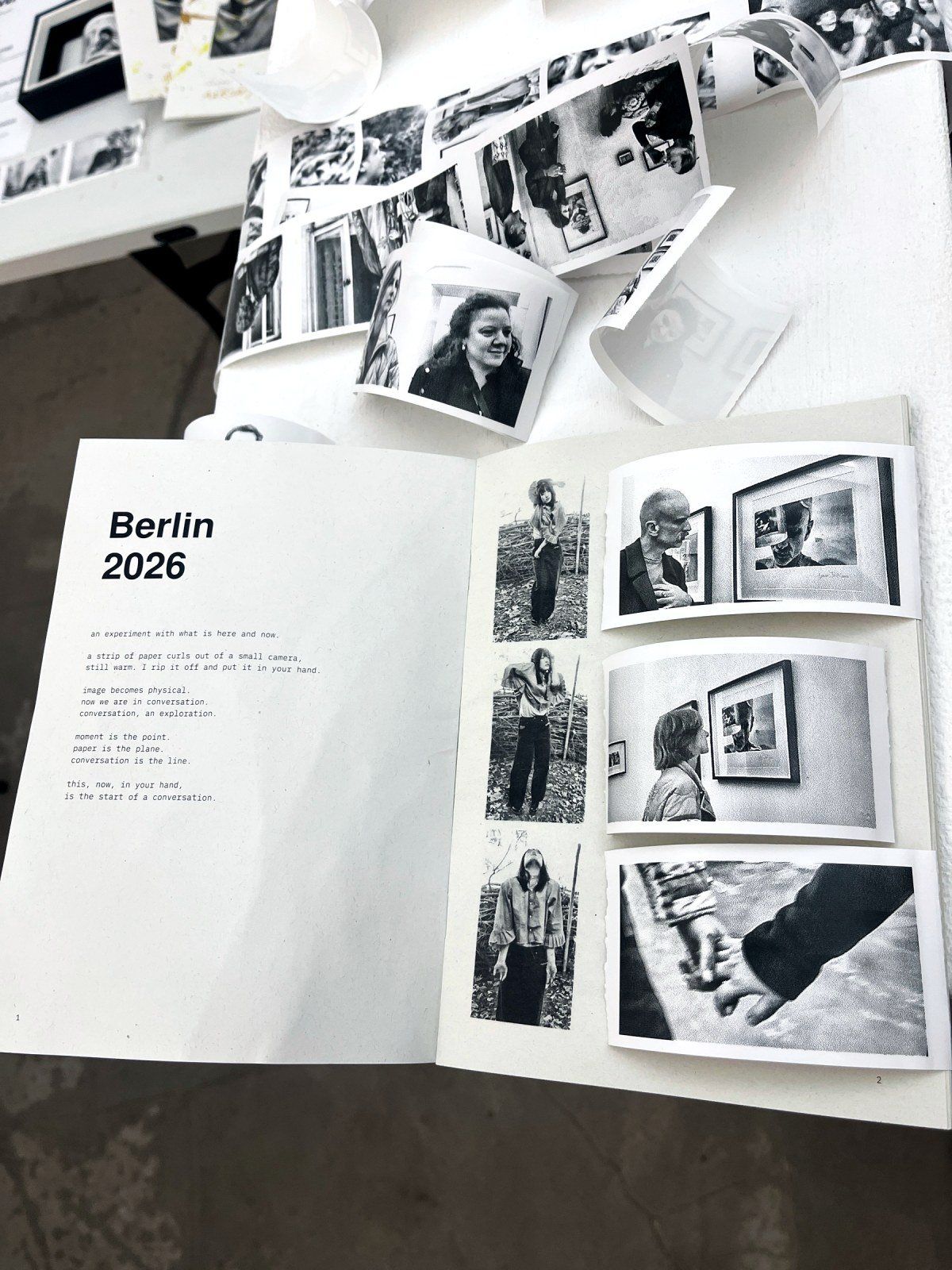 An open copy of the book on the table