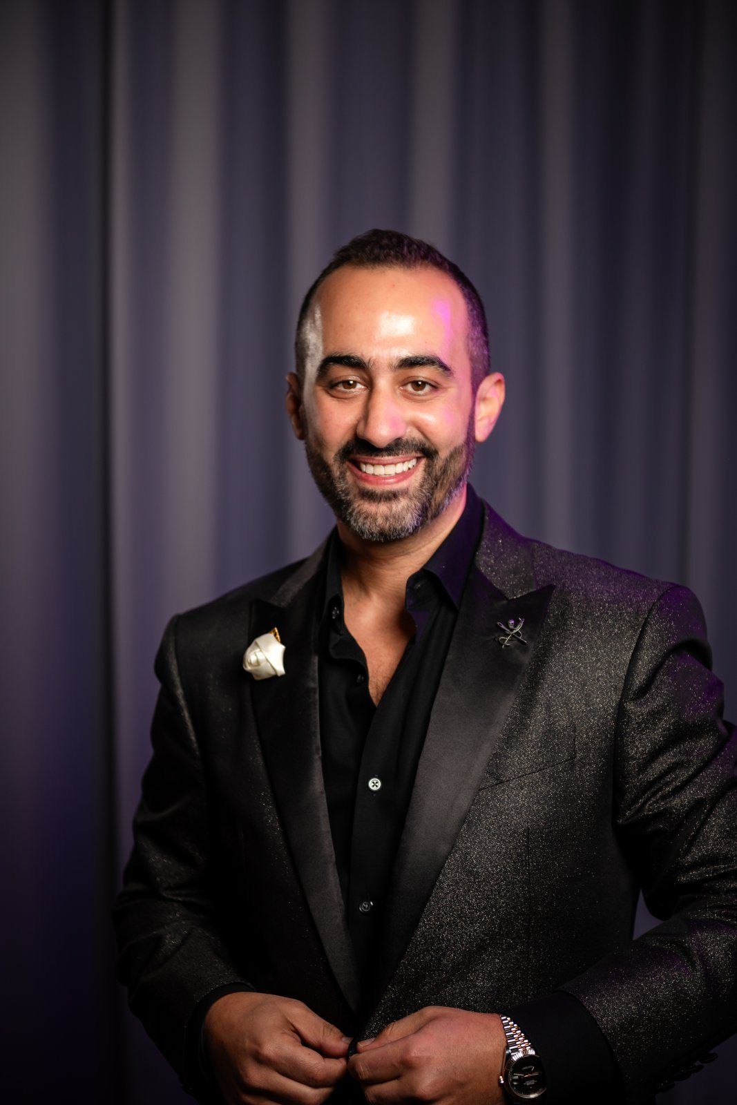 Event portrait: a guest in a black jacket