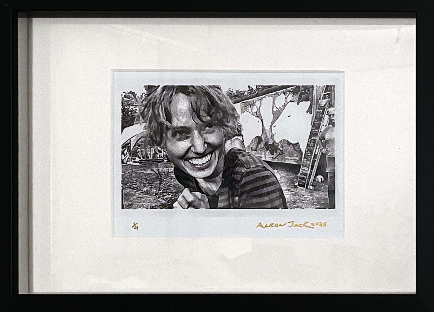 Framed print: a woman smiling among leaves