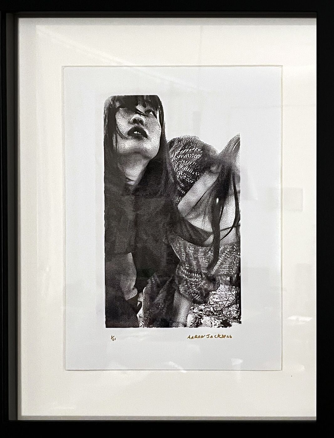 Framed print: a woman with long dark hair