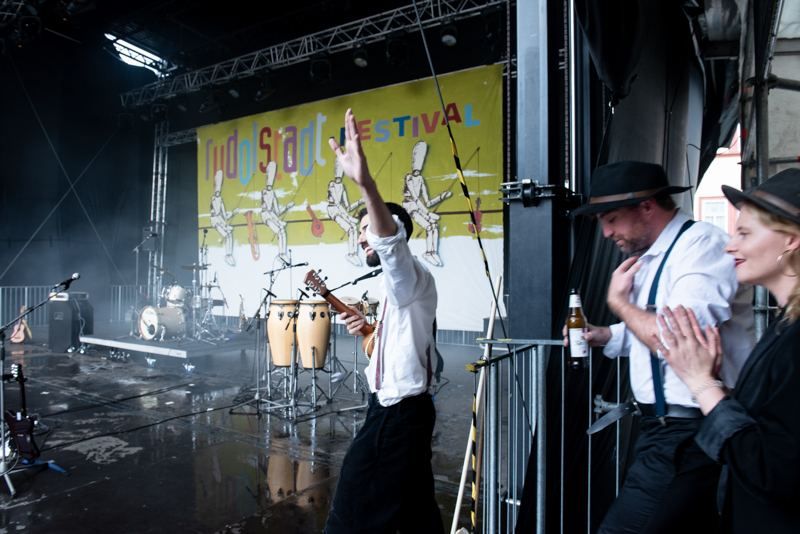Performers on a festival stage