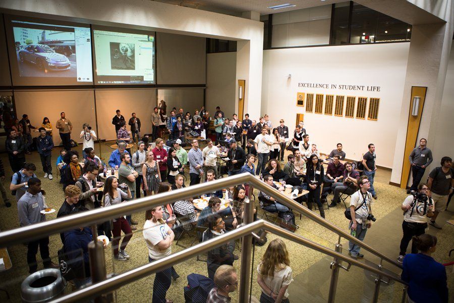 The atrium full of people, seen from the stairs