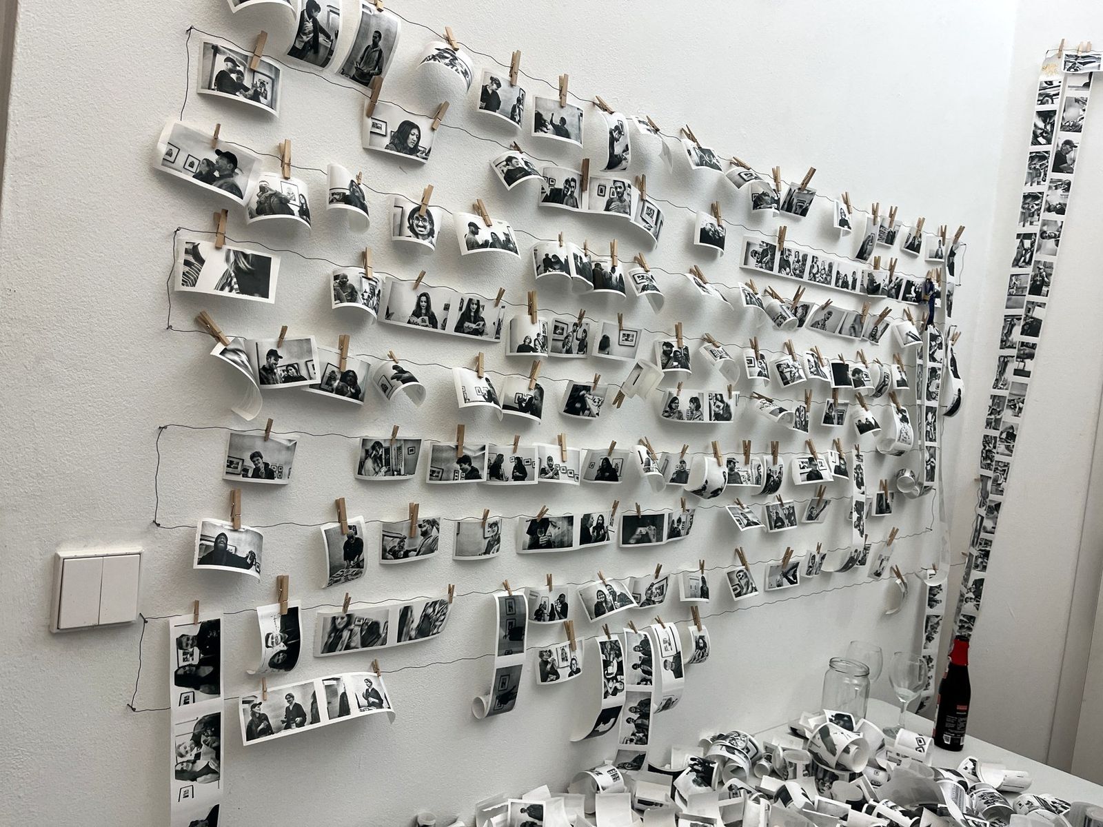 The full wall of portraits at Thermal Memories