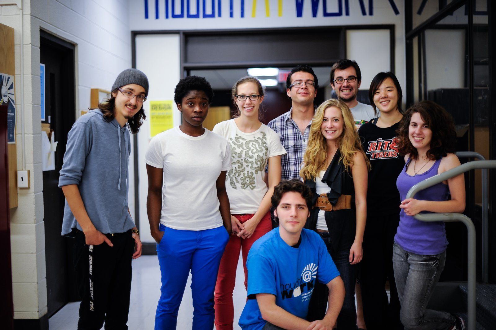 The student organising team of Thought at Work in a hallway at RIT