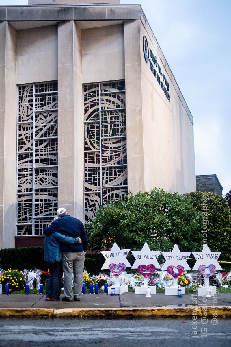 The Tree of Life synagogue with the memorial in front