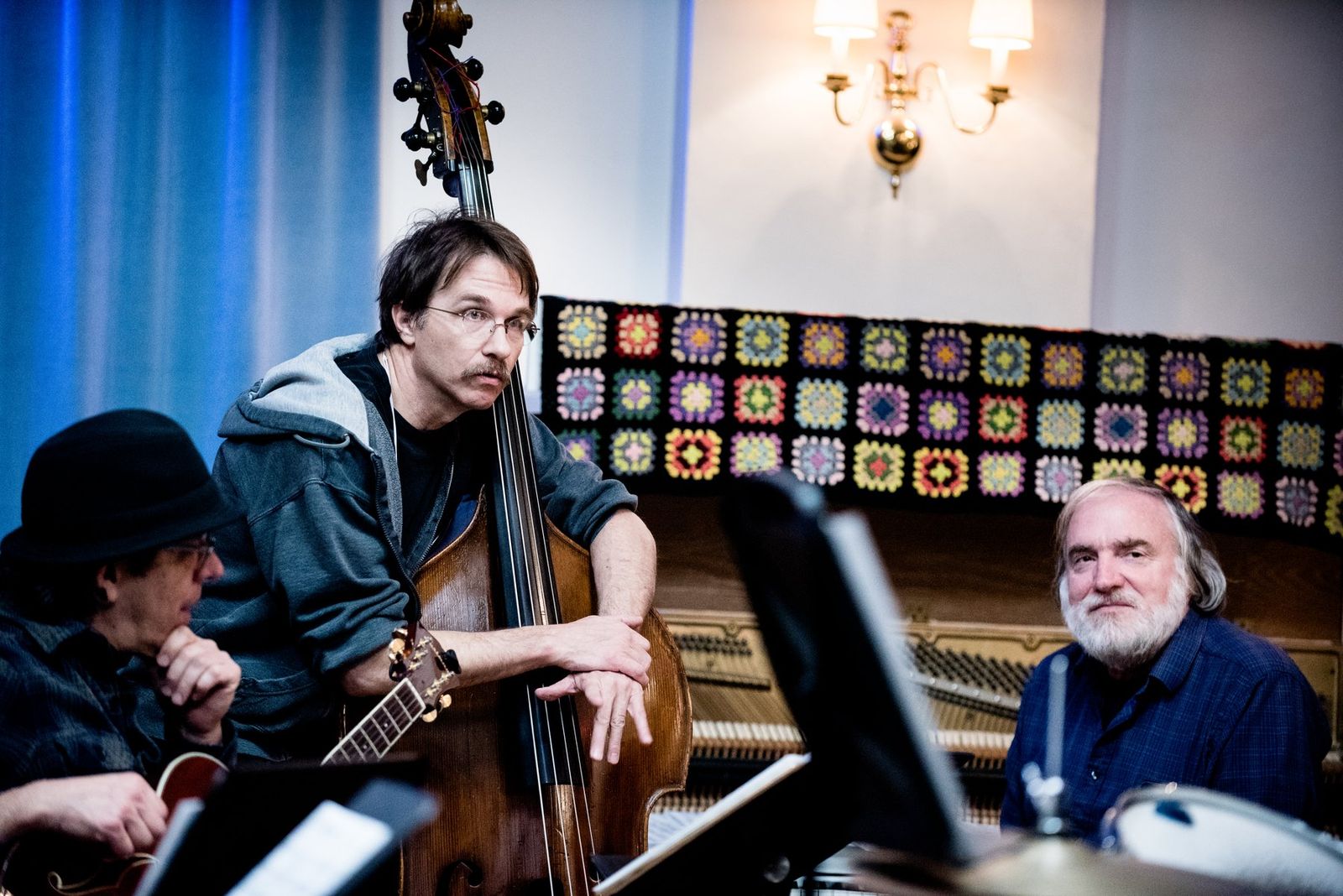 Bassist and pianist in a recording session